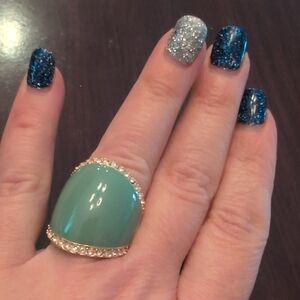 Elegant Gold and Green Statement Ring